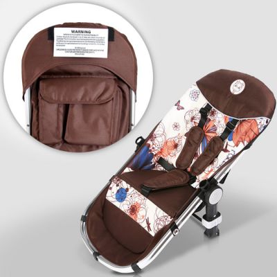 Új, barna kombi babakocsi.