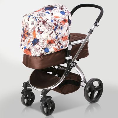 Új, barna kombi babakocsi.